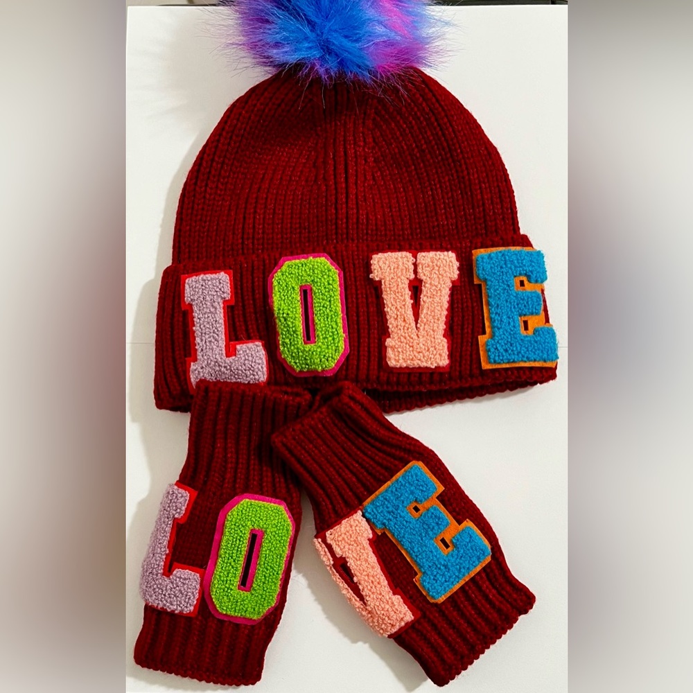 L.O.V.E knit wool beanie with matching fingerless gloves.